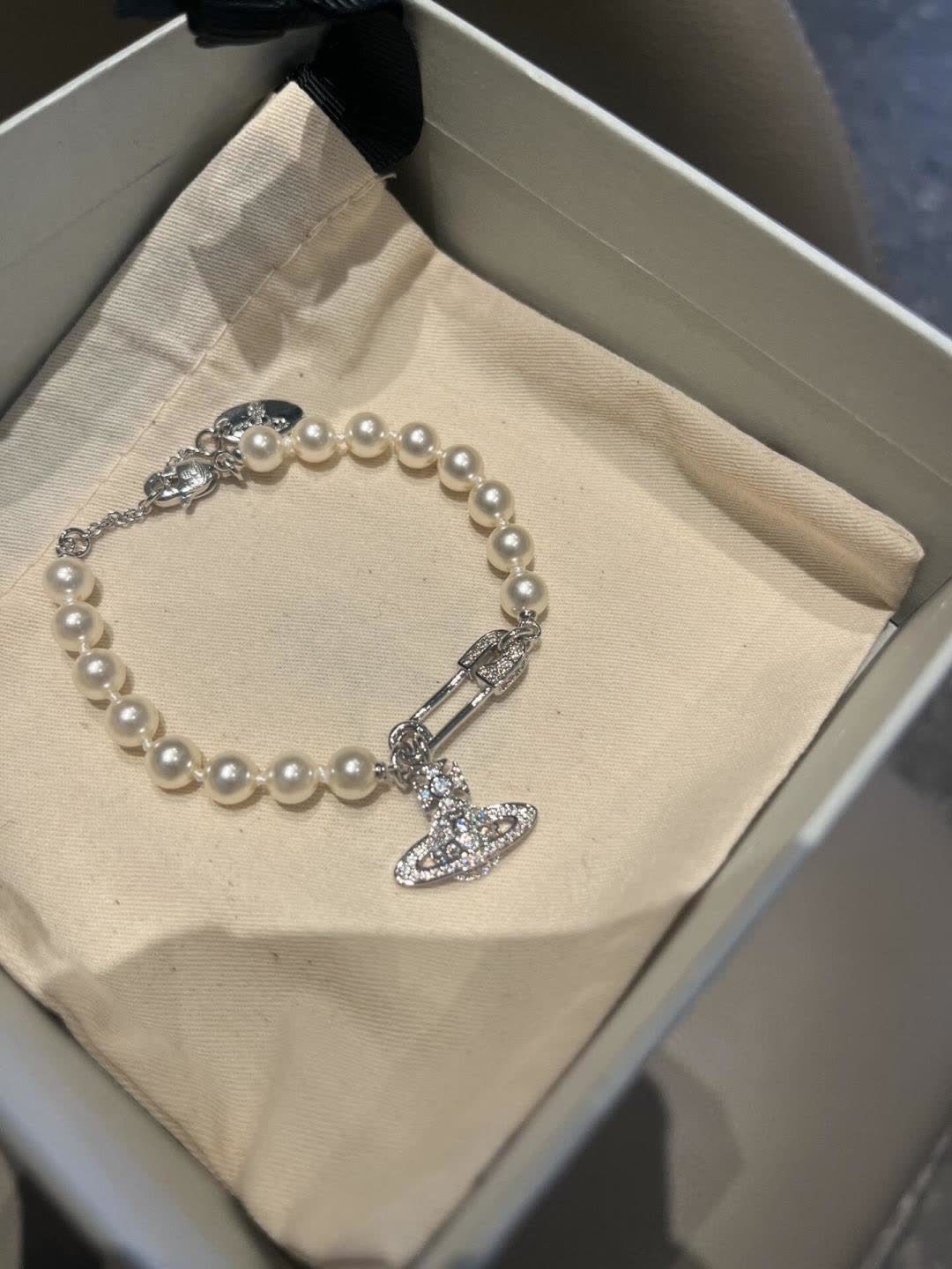 Vivienne Westwood Pearl Bracelet with Orb Charm